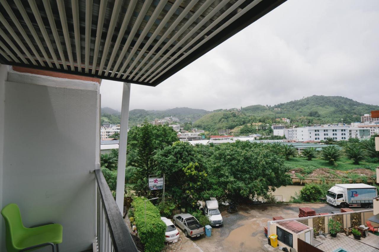 Noble House Patong Hotel Buitenkant foto