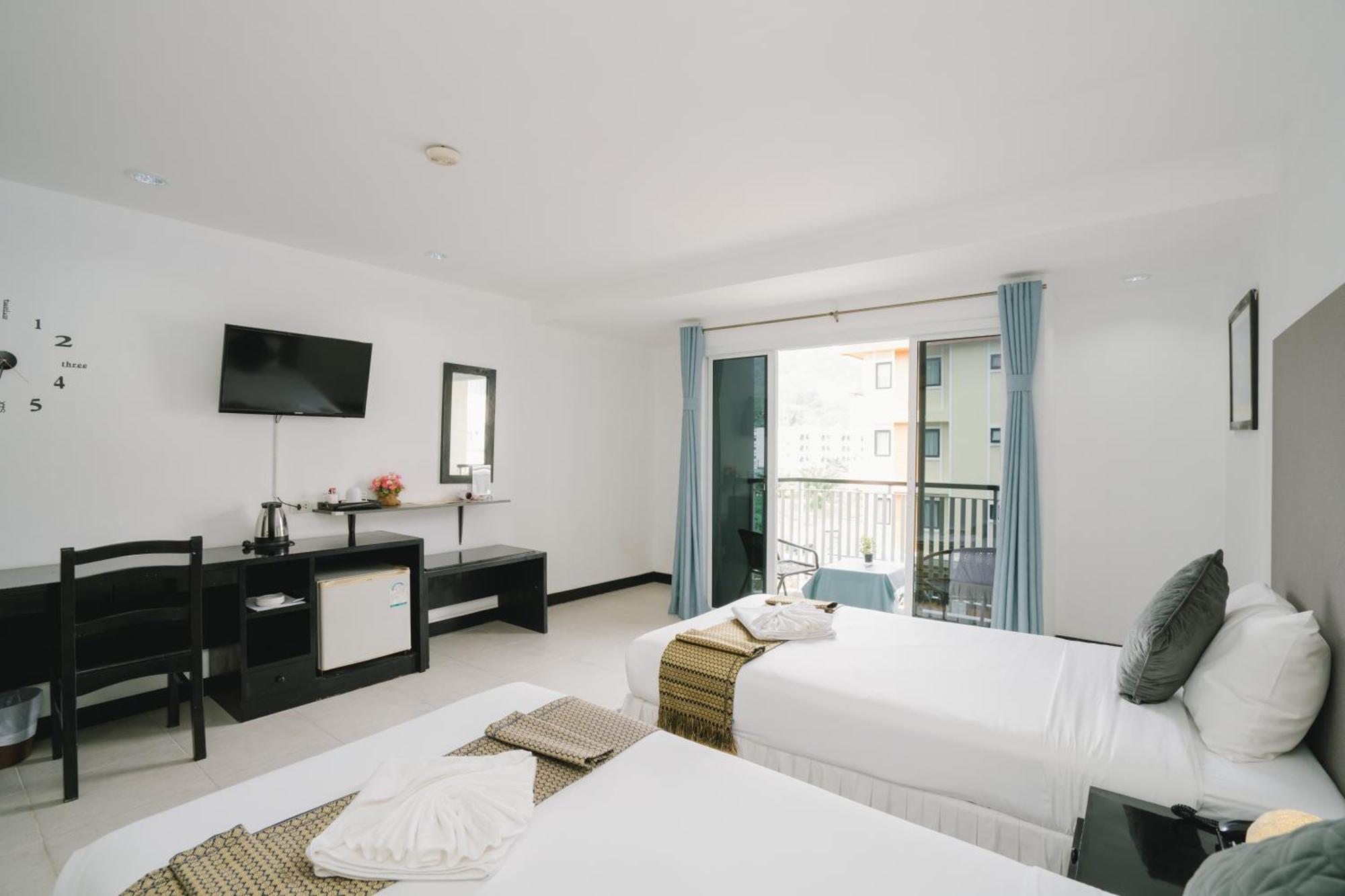 Noble House Patong Hotel Buitenkant foto