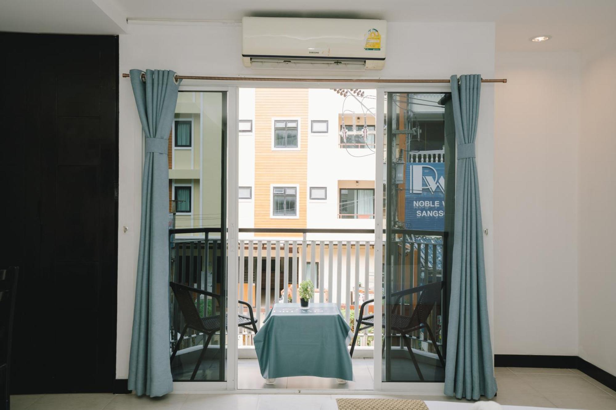 Noble House Patong Hotel Buitenkant foto