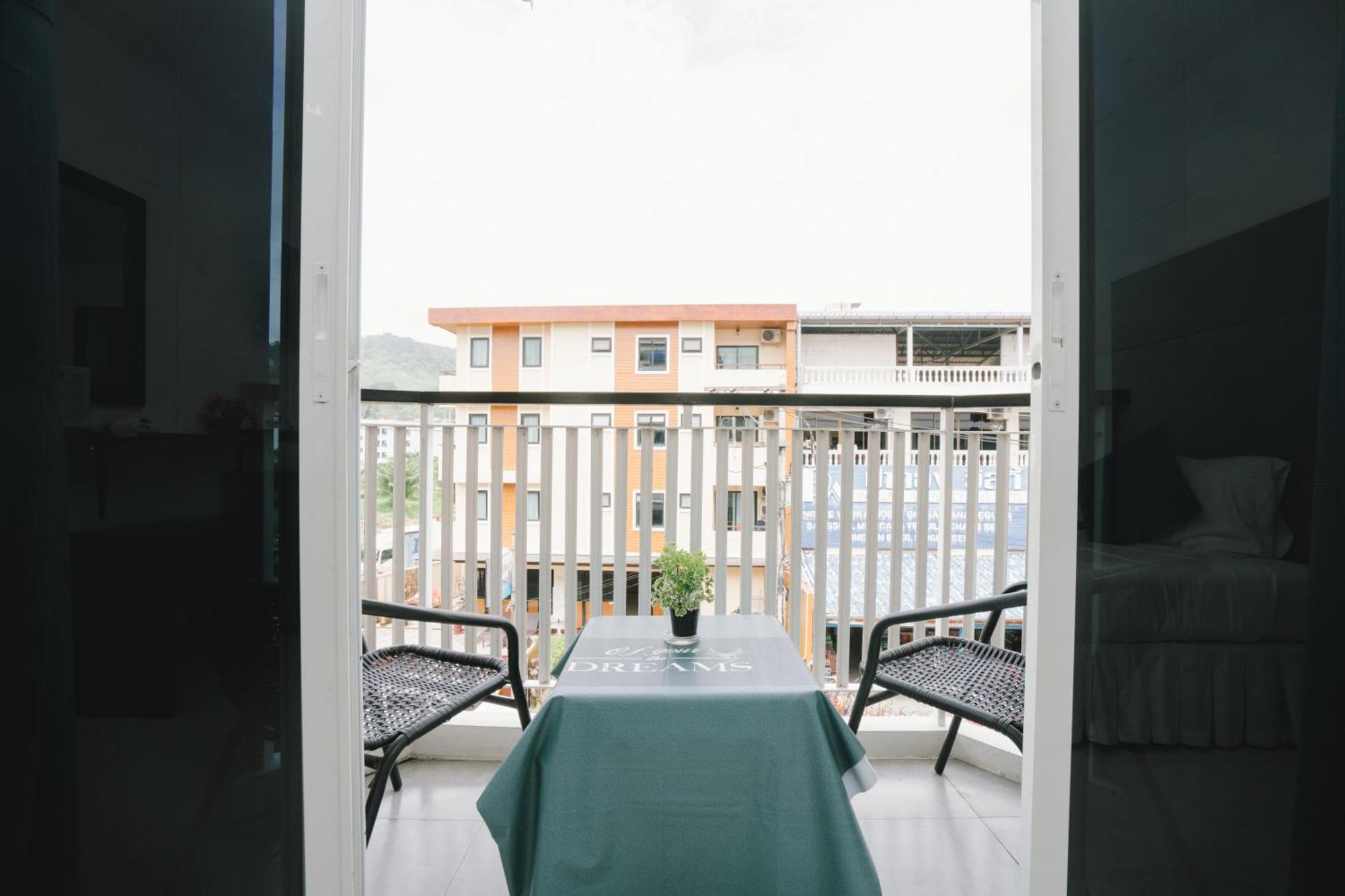 Noble House Patong Hotel Buitenkant foto