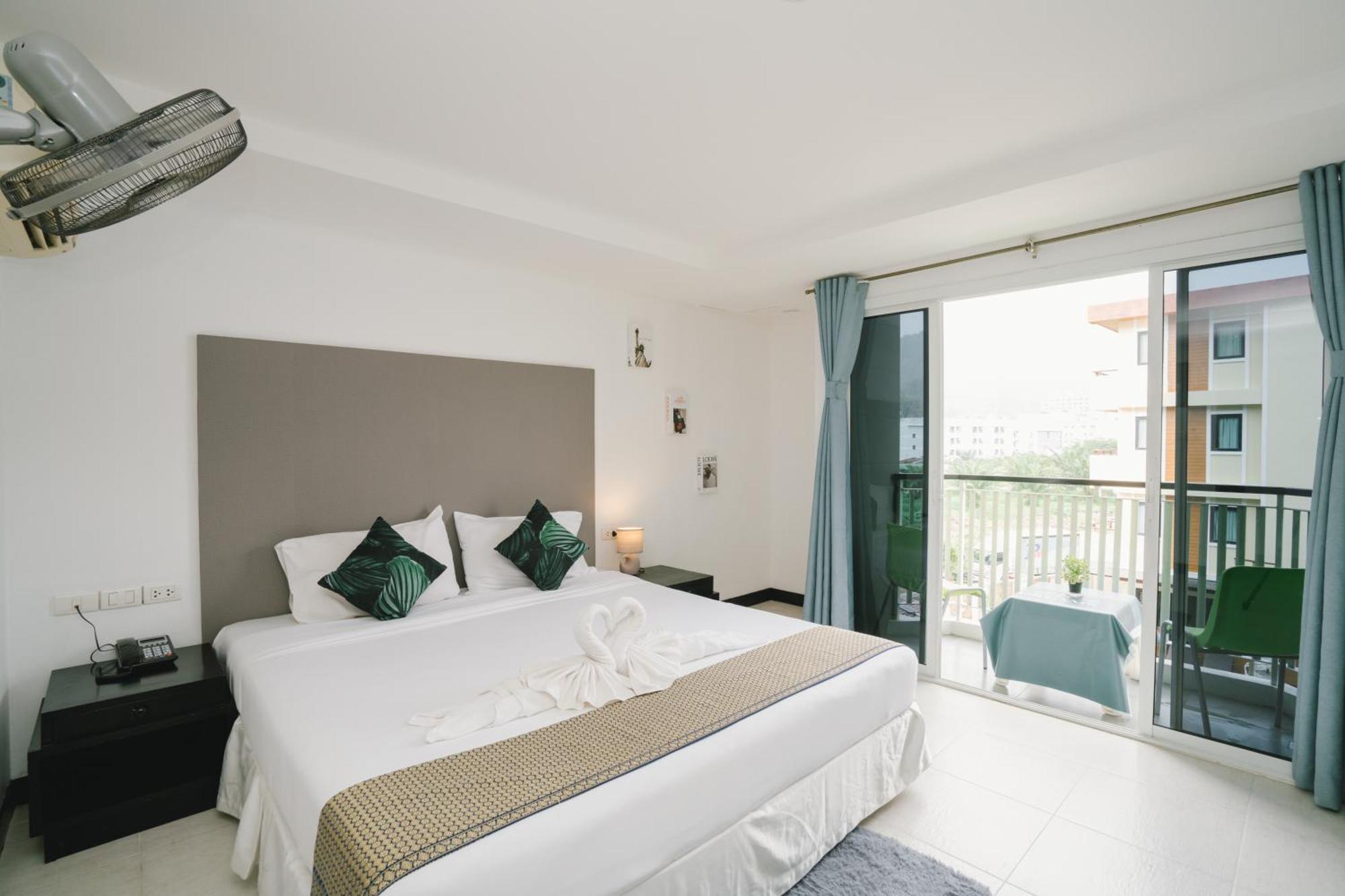 Noble House Patong Hotel Buitenkant foto